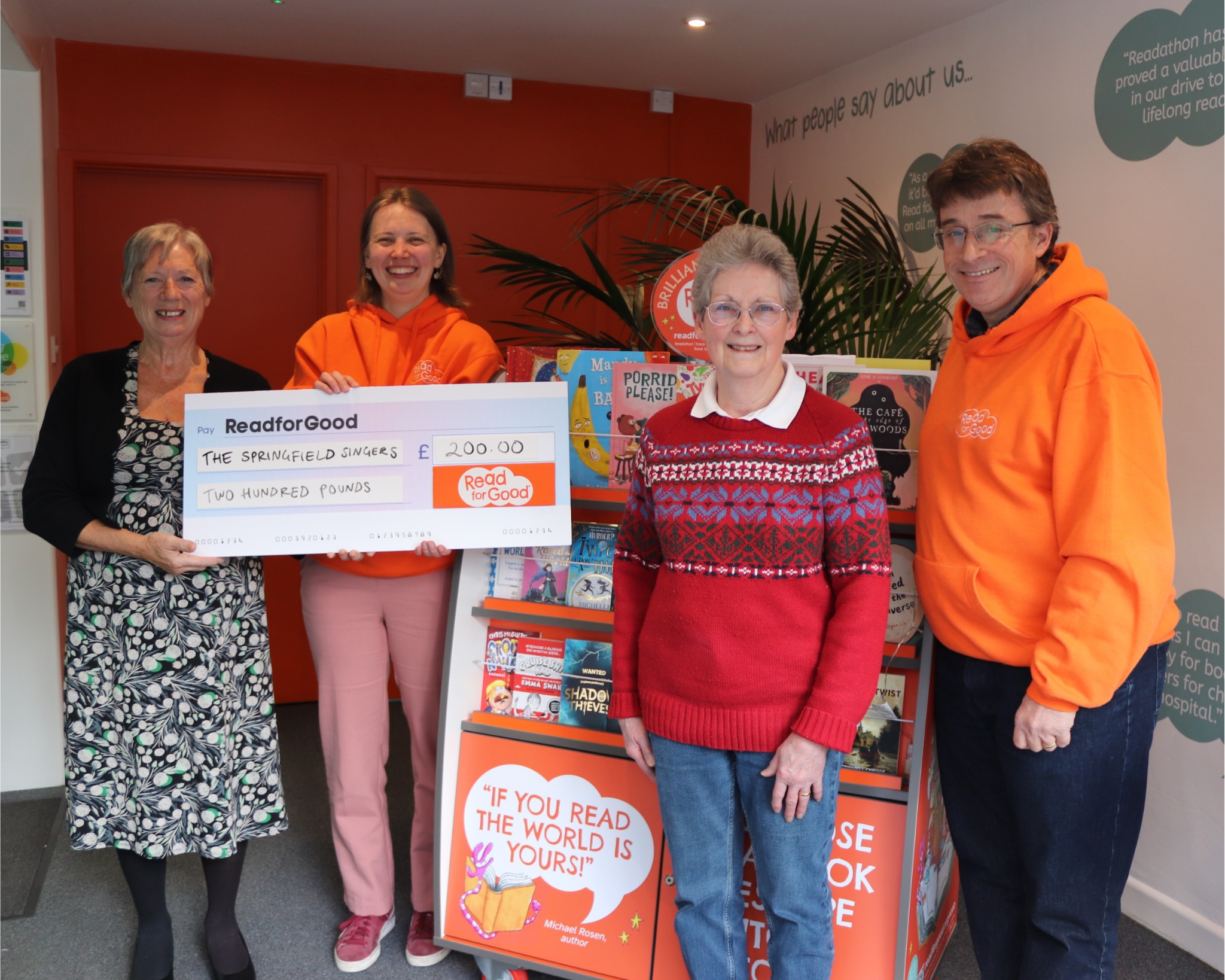 The Springfield Singers presenting a cheque to Read for Good